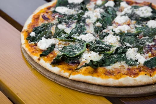 white pizza with ricotta and spinach